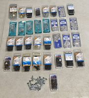 All items laid out showing quantity and variety of hardware packs and loose screws