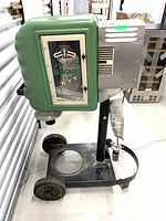 Side view of Mosquito Magnet unit on wheeled base