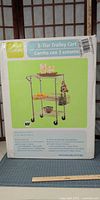 Retail box front displaying 3-tier chrome trolley cart image