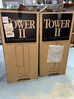 Front view of both sealed Tower II speaker boxes