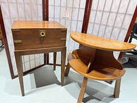 Chest on stand and demilune table front view