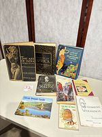 Overall lot showing nine visible books and booklets