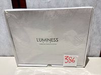 Front view of sealed Luminess Air system box with lot tag