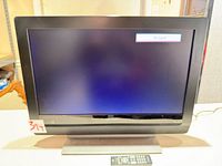 Front view of Magnavox TV powered on showing "No signal" message
