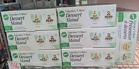Stack of seven Wilton Cupcakes 'N More Dessert Stand boxes