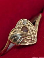 Front view of heart motif with diamond accent