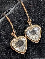 Front view of both heart moonstone earrings