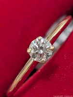 Top view of ring showing diamond and band