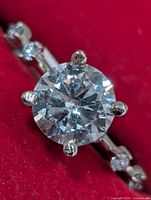 Front view of ring showing center lab diamond and prongs