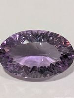 Top view of oval faceted amethyst