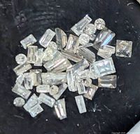 Close view of mixed cut loose diamonds