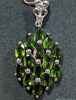 front view showing chrome diopside cluster and bail