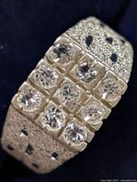 Top view showing 12 clear stones and textured shoulders