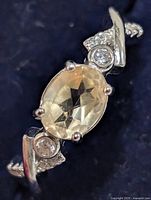 Top view of ring showing citrine and accent stones