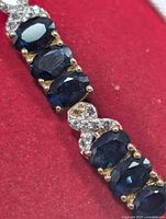 Close-up of sapphire settings and accent stones