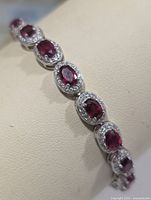 close-up of ruby and CZ links