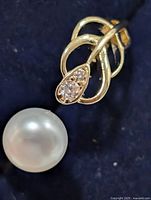 Top view showing pearl and stone-set leaf motif