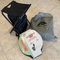 Folding stool, Ozark Trail bagged air mattress, Reliance Lugable Loo seat