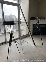 Full view of three pieces: BZG tripod, projector screen with stand, Vankyo stand