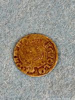 Obverse of Polish silver coin showing partial legend and crest