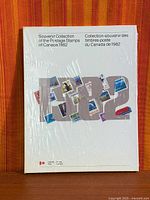 Front view of sealed 1982 stamp collection album in shrink-wrap