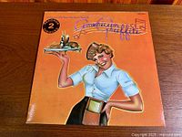 Front cover with carhop art and 2-Record Set badge