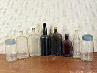 All eight bottles and jars lined up