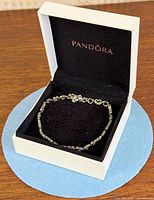 Necklace in open Pandora box