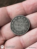 Reverse of 1887 Canada large cent showing ONE CENT 1887 surrounded by maple leaves