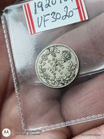 Reverse side of coin showing wreath, crown, 10 CENTS CANADA 1920