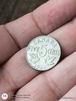 Reverse showing CANADA FIVE CENTS, maple leaves, date 1929