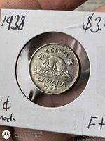 Reverse of 1938 Canadian 5-cent coin in 2×2 flip