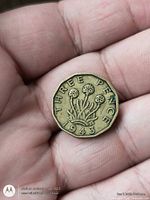 Reverse showing thrift plant design and date 1943