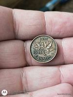 Reverse showing maple leaf sprig and 1948 date