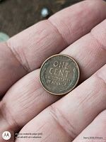 reverse of the 1958 wheat cent showing ONE CENT and wheat ears