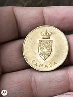 Obverse showing Canadian coat of arms and CANADA legend