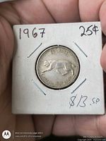 Reverse showing bobcat design, year 1967, denomination 25 cents