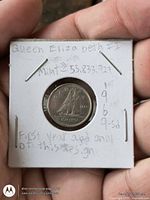 Front of holder showing reverse Bluenose schooner side of 1969 dime