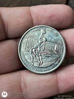 Obverse of token showing Canadian Football Hall of Fame scene