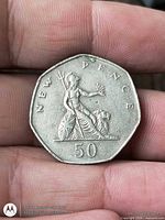 Reverse showing Britannia, denomination 50