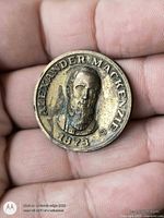 Obverse side showing Alexander Mackenzie portrait and date 1873