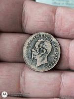 Obverse of copper coin showing bust of Vittorio Emanuele II with legend