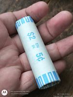 Full view of sealed Canadian nickel roll