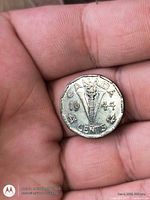 Obverse view showing Canada, 1944, V-torch design