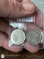 Obverse side showing King George V portrait on both coins