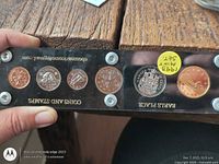 Front view of acrylic case with all six 1993 Canadian coins