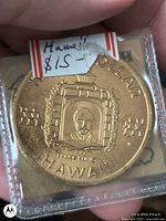 Obverse showing Prince Kuhio portrait, legend "HAWAII DOLLAR"