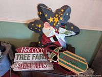 All three Christmas decor pieces grouped together