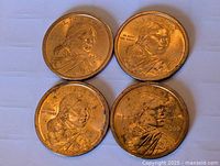 Four Sacagawea dollars obverse visible