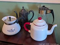 Group shot of all four coffee and tea pots